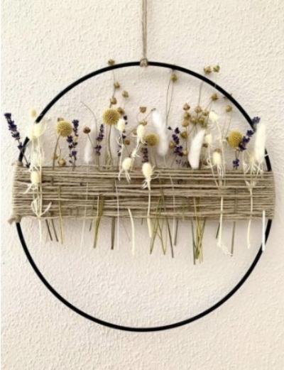 Recycle an old ring using jute and airflowers to create this decor