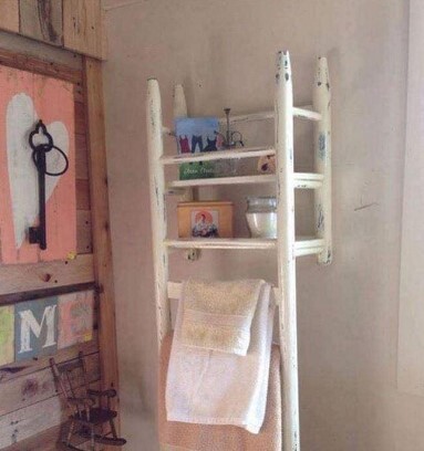 Chair turned into a shelf and towel hanger