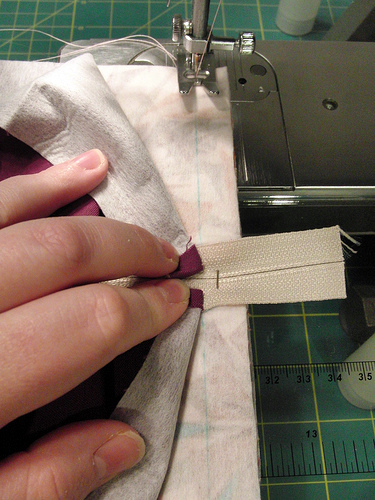 sewing machine and fabric to stitch zipper